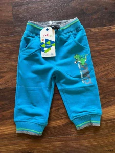 Tepláky KUGO  vel. 68